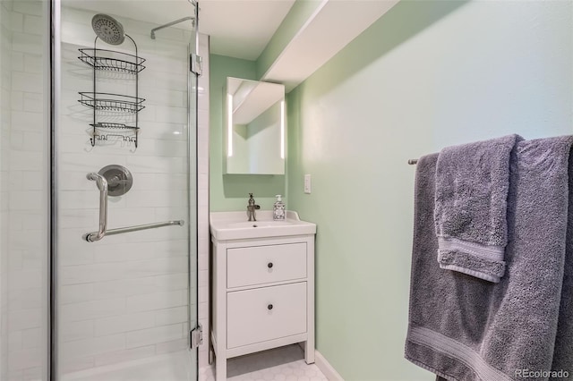 full bath featuring vanity and a stall shower