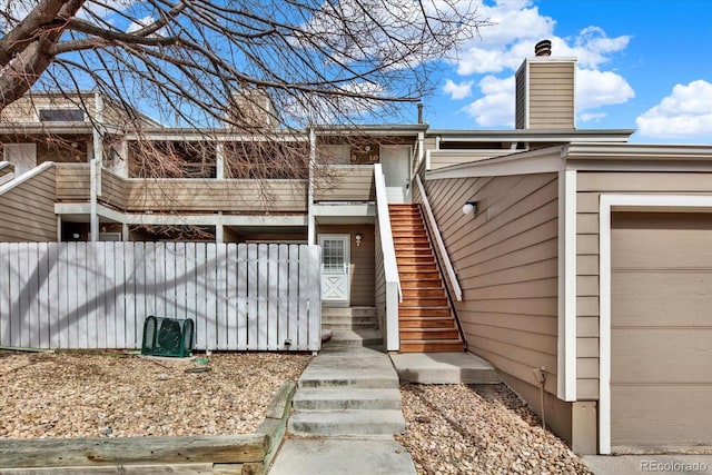 8055 E Colorado Ave Unit 8, Denver, CO 80231 - property entrance with a chimney