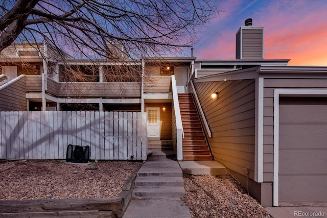8055 E Colorado Ave Unit 8, Denver, CO 80231 - view of front of house with stairway and a chimney