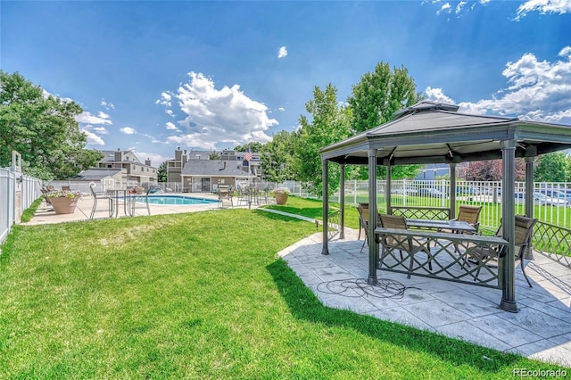 8055 E Colorado Ave Unit 8, Denver, CO 80231 - fenced backyard with a gazebo and a patio