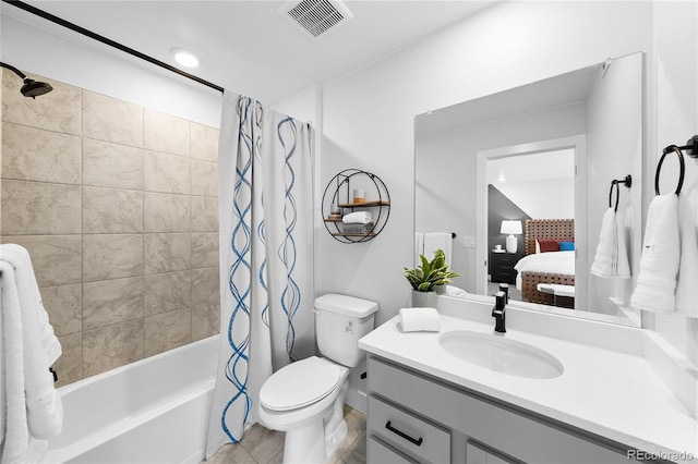 17137 W 91st Ln, Arvada, CO 80007 - bathroom featuring shower / bath combo with shower curtain, vanity, ensuite bath, and tile patterned floors