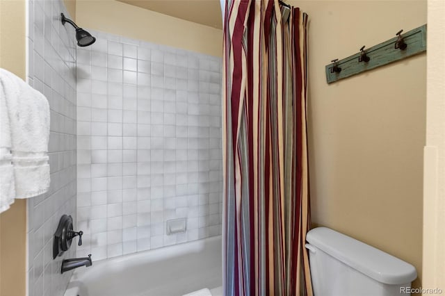 full bath featuring shower / bath combination with curtain and toilet