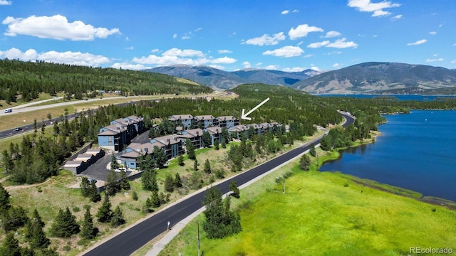 bird's eye view of a water and mountain view