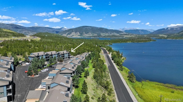 drone / aerial view of a water and mountain view