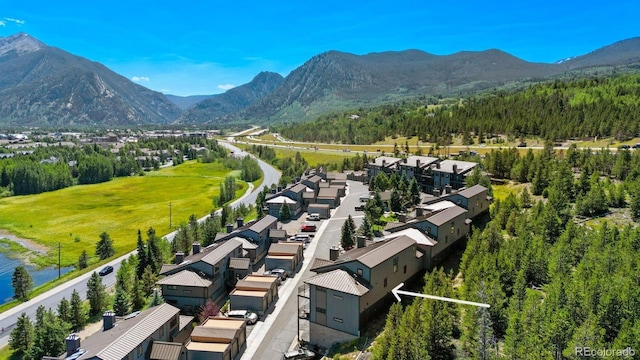 aerial perspective of suburban area featuring a mountain backdrop