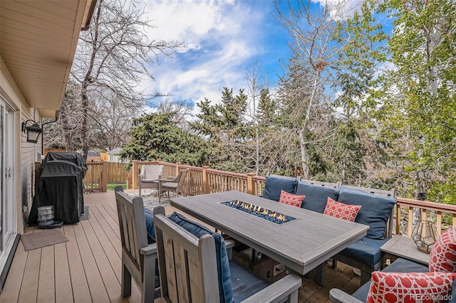 deck with an outdoor fire pit