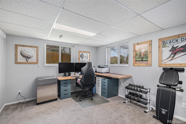 92 Helena Cir, Littleton, CO 80124 - office area featuring carpet flooring, baseboards, wood walls, and a paneled ceiling
