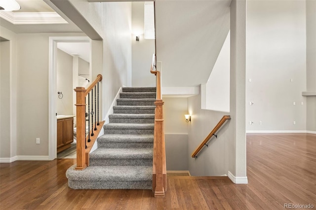 19782 W 59th Ave, Golden, CO 80403 - stairway featuring wood finished floors and baseboards