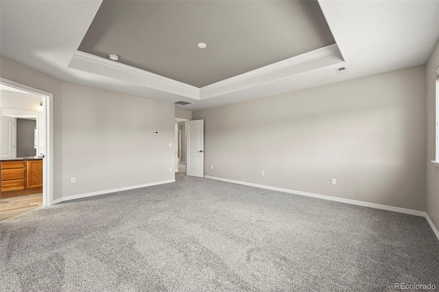 19782 W 59th Ave, Golden, CO 80403 - unfurnished room with a raised ceiling, crown molding, carpet floors, and baseboards