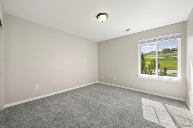 19782 W 59th Ave, Golden, CO 80403 - carpeted spare room featuring baseboards