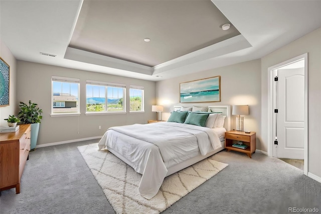 19782 W 59th Ave, Golden, CO 80403 - bedroom with a tray ceiling, carpet floors, baseboards, and ornamental molding