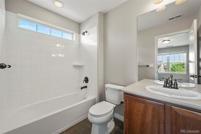 19782 W 59th Ave, Golden, CO 80403 - full bath featuring vanity, toilet,  shower combination, baseboards, and wood finished floors