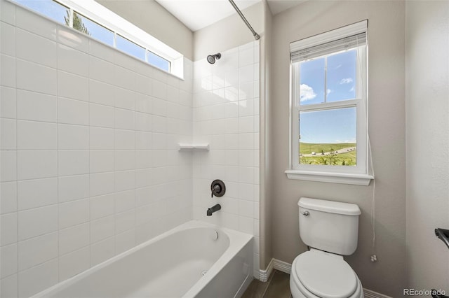 19782 W 59th Ave, Golden, CO 80403 - full bath with toilet, tub / shower combination, baseboards, and wood finished floors
