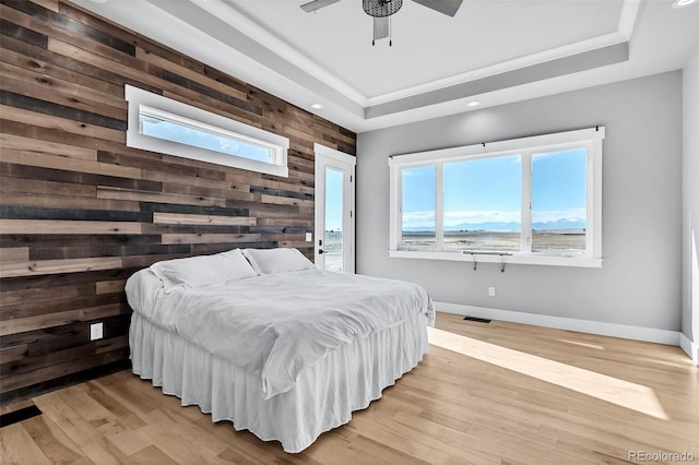 7668 Buckskin Ranch Vw, Peyton, CO 80831 - bedroom with recessed lighting, light wood finished floors, wood walls, and baseboards
