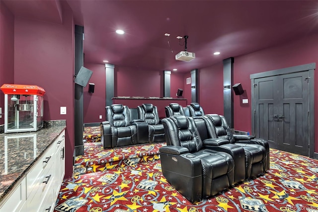 7668 Buckskin Ranch Vw, Peyton, CO 80831 - cinema room with carpet floors and recessed lighting