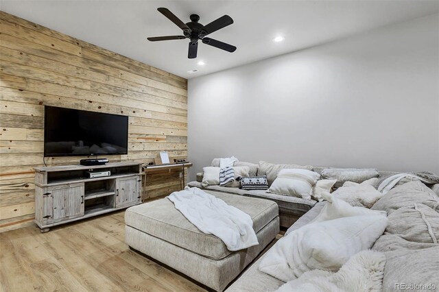 7668 Buckskin Ranch Vw, Peyton, CO 80831 - living room featuring recessed lighting, wooden walls, light wood-style floors, and ceiling fan