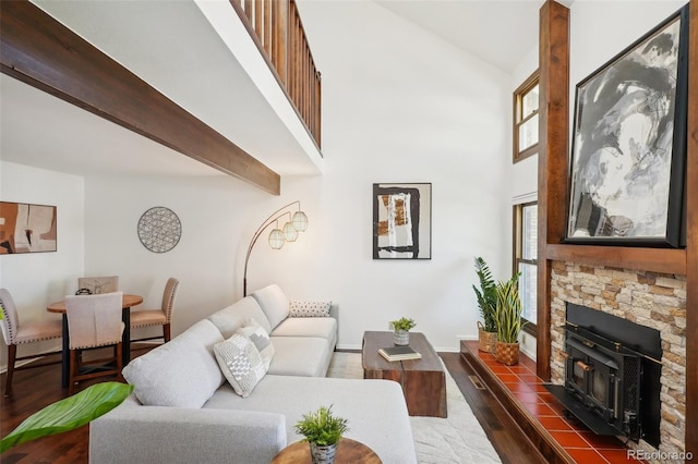 living room with beam ceiling and dark hardwood / wood-style flooring