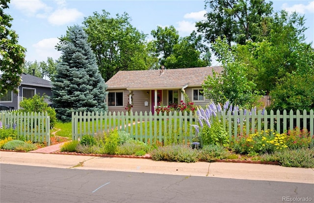 5584 S Datura St, Littleton, CO 80120 - view of front facade with a fenced front yard