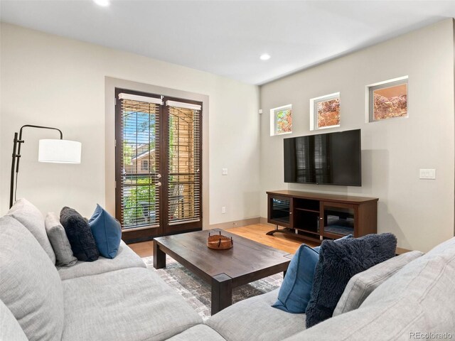 2741 Java Ct, Denver, CO 80211 - living area featuring wood finished floors, recessed lighting, and baseboards
