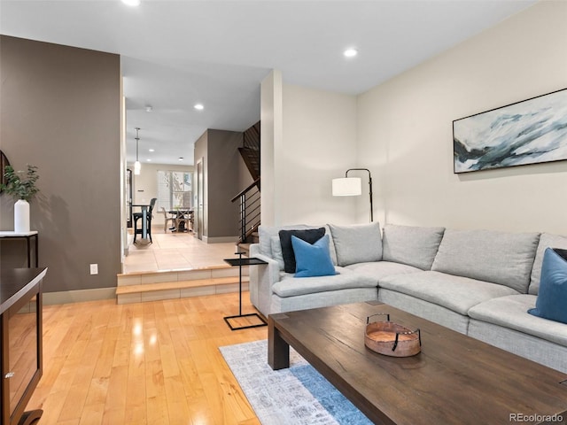 2741 Java Ct, Denver, CO 80211 - living area featuring stairs, light wood-style floors, recessed lighting, and baseboards