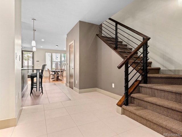 2741 Java Ct, Denver, CO 80211 - staircase with baseboards, recessed lighting, and tile patterned floors