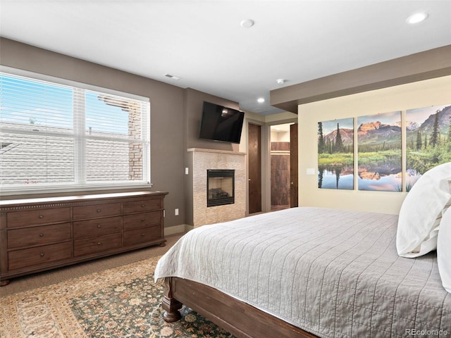 2741 Java Ct, Denver, CO 80211 - bedroom with recessed lighting, carpet floors, a tile fireplace, and baseboards