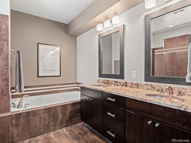 2741 Java Ct, Denver, CO 80211 - bathroom with a garden tub and double vanity