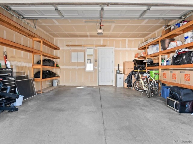 2741 Java Ct, Denver, CO 80211 - garage with a garage door opener