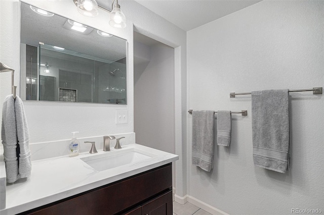 7696 S Hudson Way, Centennial, CO 80122 - bathroom featuring vanity, an enclosed shower, and tile patterned flooring