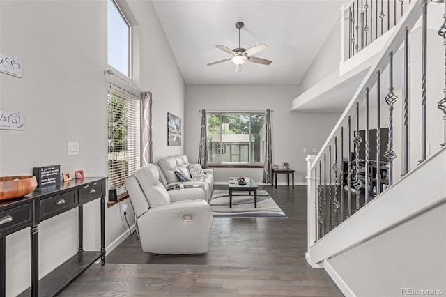 1371 W 133rd Way, Denver, CO 80234 - living area with high vaulted ceiling, plenty of natural light, ceiling fan, wood finished floors, and stairway