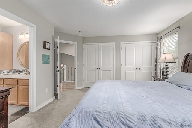 1371 W 133rd Way, Denver, CO 80234 - bedroom featuring two closets, carpet flooring, and connected bathroom