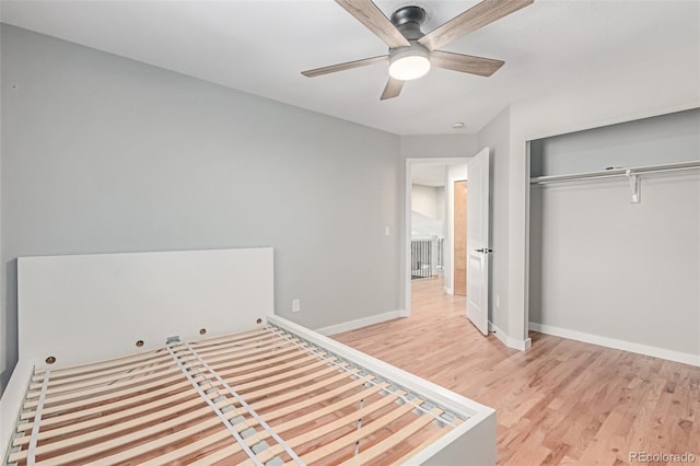 1371 W 133rd Way, Denver, CO 80234 - unfurnished bedroom with light wood-type flooring, a closet, and ceiling fan