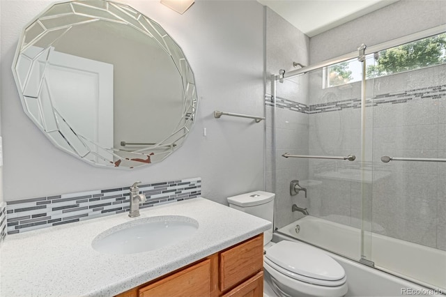 1371 W 133rd Way, Denver, CO 80234 - full bath with combined bath / shower with glass door, vanity, and backsplash