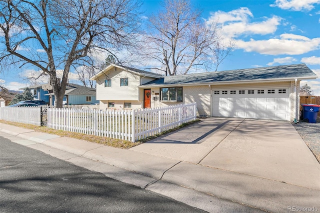 split level home with a garage