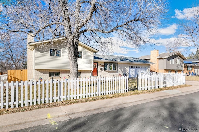 tri-level home with a garage