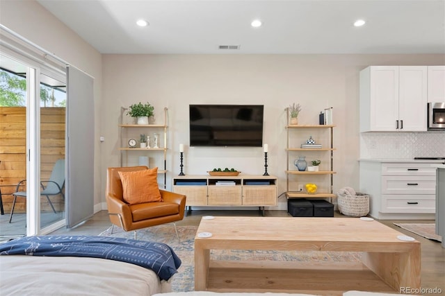 3103 S Cherokee St, Englewood, CO 80110 - living area featuring recessed lighting and wood finished floors