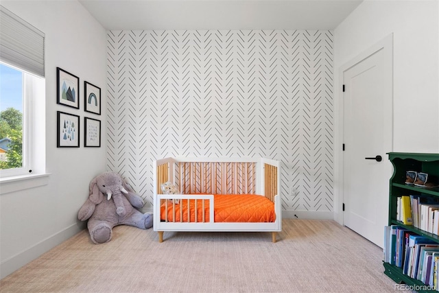 3103 S Cherokee St, Englewood, CO 80110 - sitting room featuring an accent wall, wallpapered walls, and carpet
