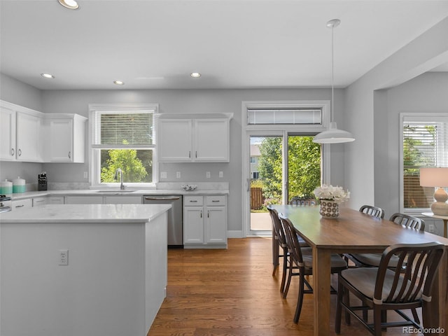 16362 Oakmoor Pl, Parker, CO 80134 - kitchen featuring dishwasher, light countertops, white cabinets, recessed lighting, and dark wood-style floors