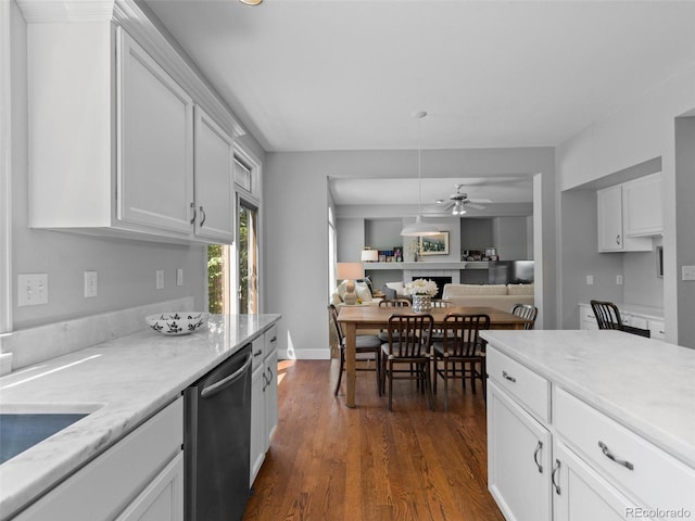 16362 Oakmoor Pl, Parker, CO 80134 - kitchen featuring stainless steel dishwasher, a ceiling fan, white cabinets, open floor plan, and dark wood finished floors