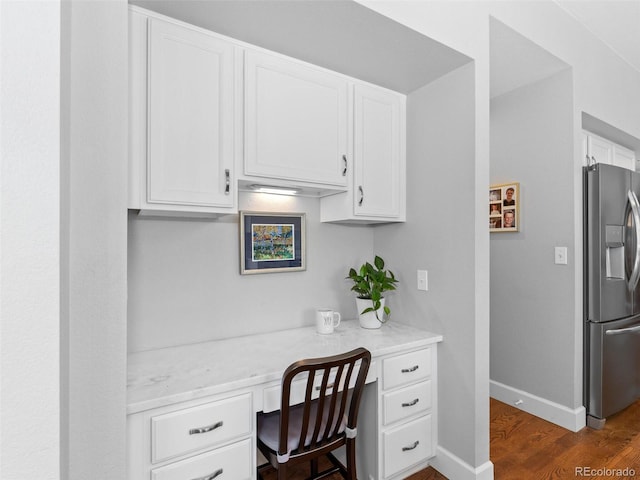 16362 Oakmoor Pl, Parker, CO 80134 - office space featuring built in desk and dark wood-style flooring