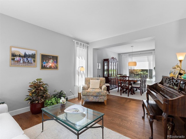 16362 Oakmoor Pl, Parker, CO 80134 - living area featuring wood finished floors and baseboards