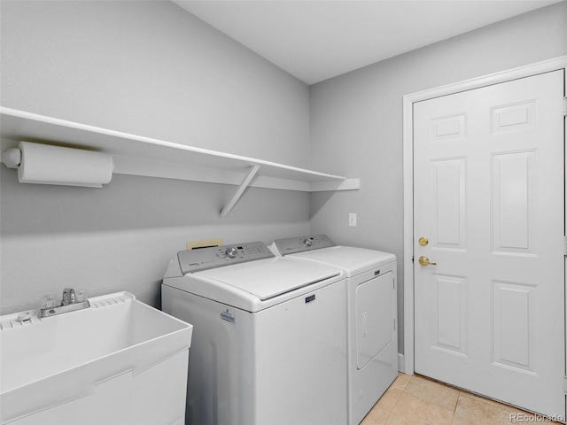 16362 Oakmoor Pl, Parker, CO 80134 - laundry room with washer and clothes dryer and light tile patterned flooring