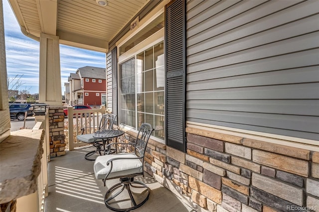 balcony featuring covered porch