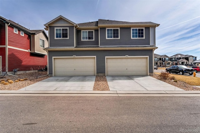 view of front of house featuring driveway and an attached garage