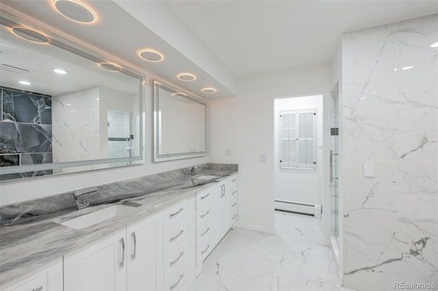 bathroom featuring baseboard heating, vanity, walk in shower, and tile patterned floors