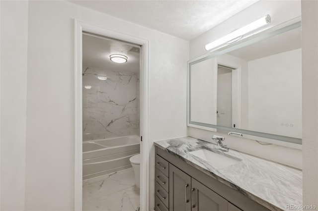 full bathroom featuring tiled shower / bath, a textured ceiling, tile patterned flooring, vanity, and toilet