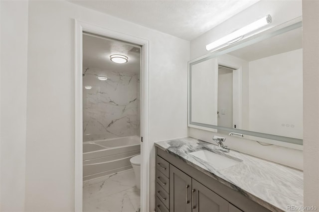 bathroom featuring a textured ceiling, shower / tub combination, toilet, vanity, and marble finish floor