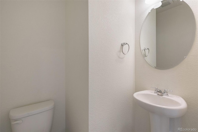 6721 Raven Ridge Ter, Colorado Springs, CO 80925 - half bath with a sink and toilet