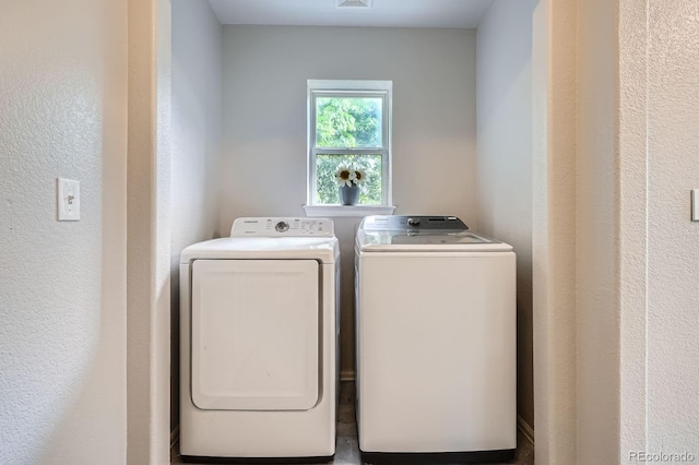 11029 Grouse Ct, Parker, CO 80134 - laundry area featuring washer and clothes dryer