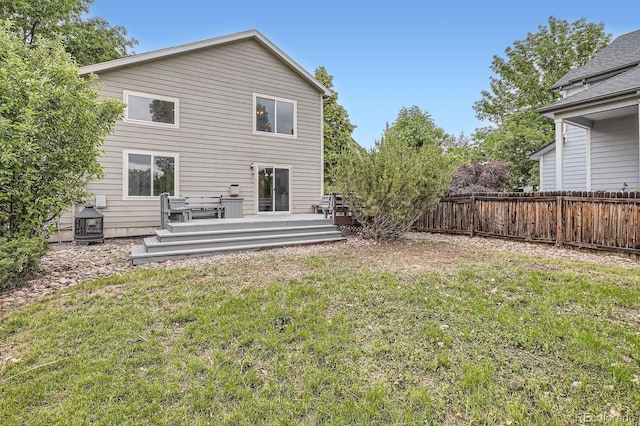 11029 Grouse Ct, Parker, CO 80134 - rear view of property featuring a fenced backyard and a deck